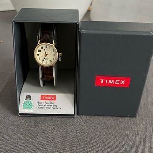 Timex ladies watch.  Brown band